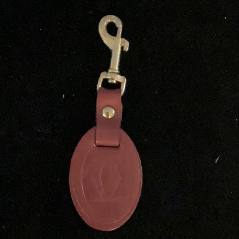 Cartier Elegant Red Leather Keychain with Gold Hardware